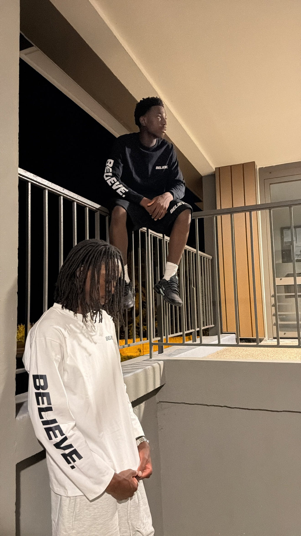 BELIEVE. Essential Long Sleeve Black worn